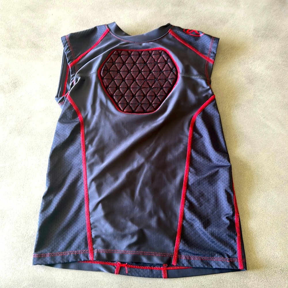 Lightly worn baseball body protective shirt youth large.